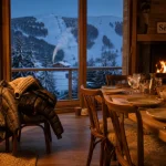 Réunions familiales Super Besse : salon ski avec vue sur les pistes du Sancy